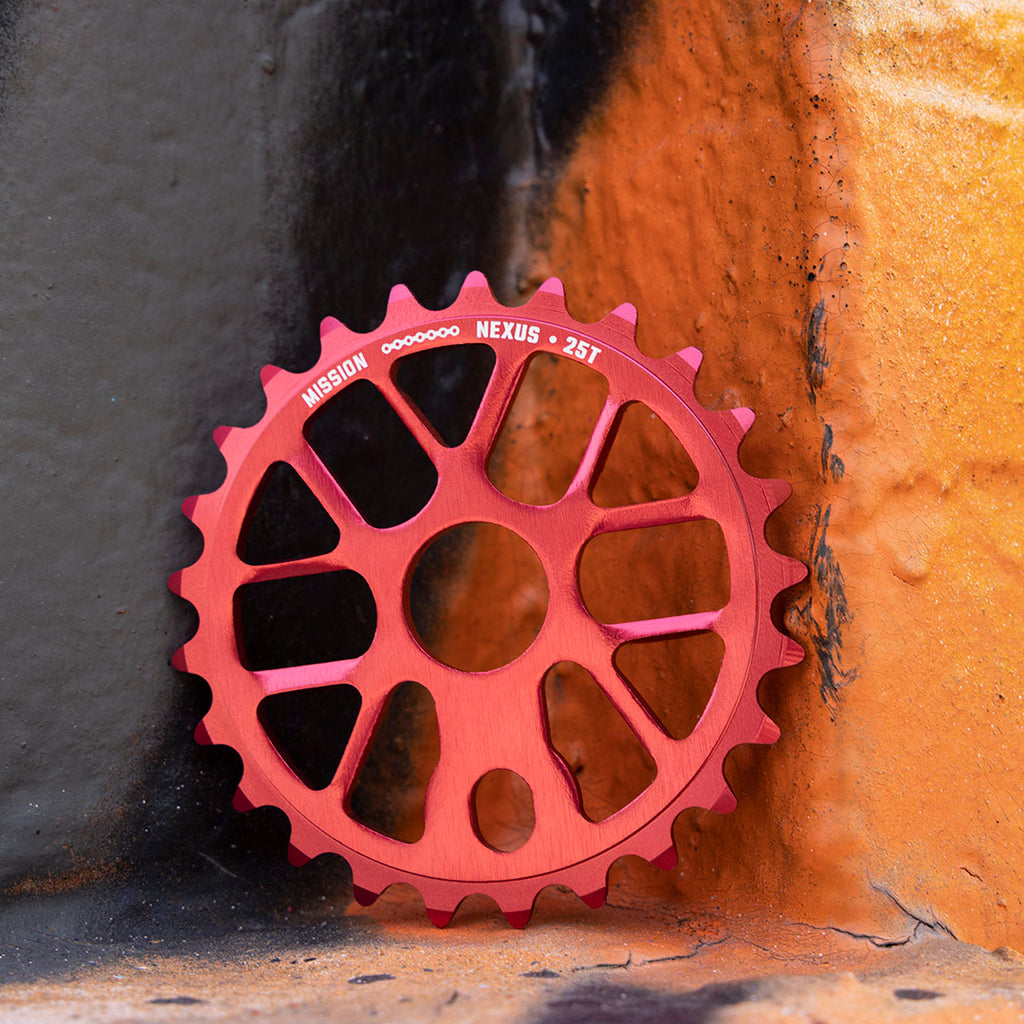 Anodized red Mission Nexus sprockets.